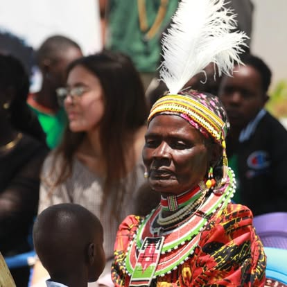 An elder community member engaging with BintiCare's team