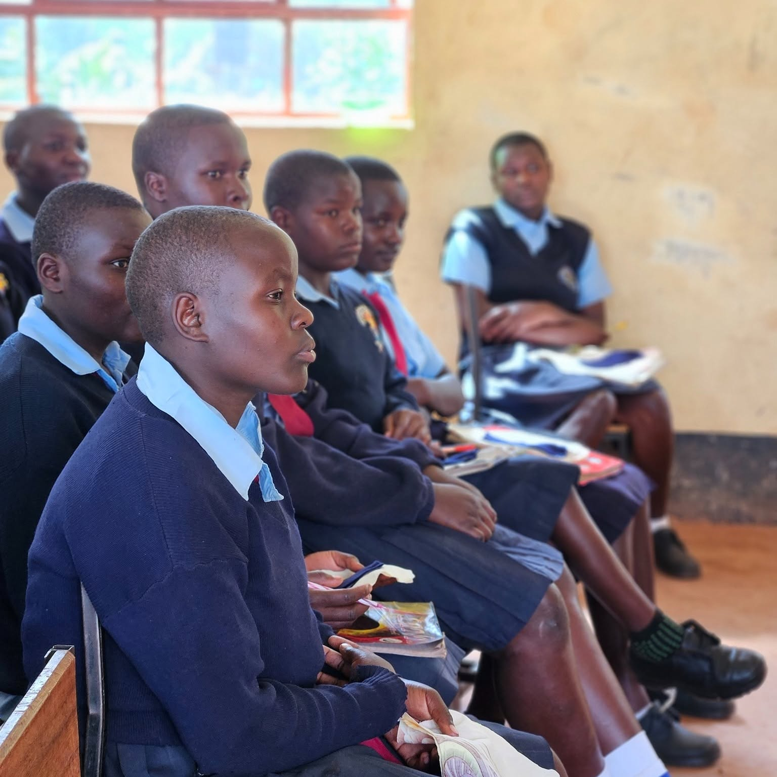 Scholars engaged in a classroom session