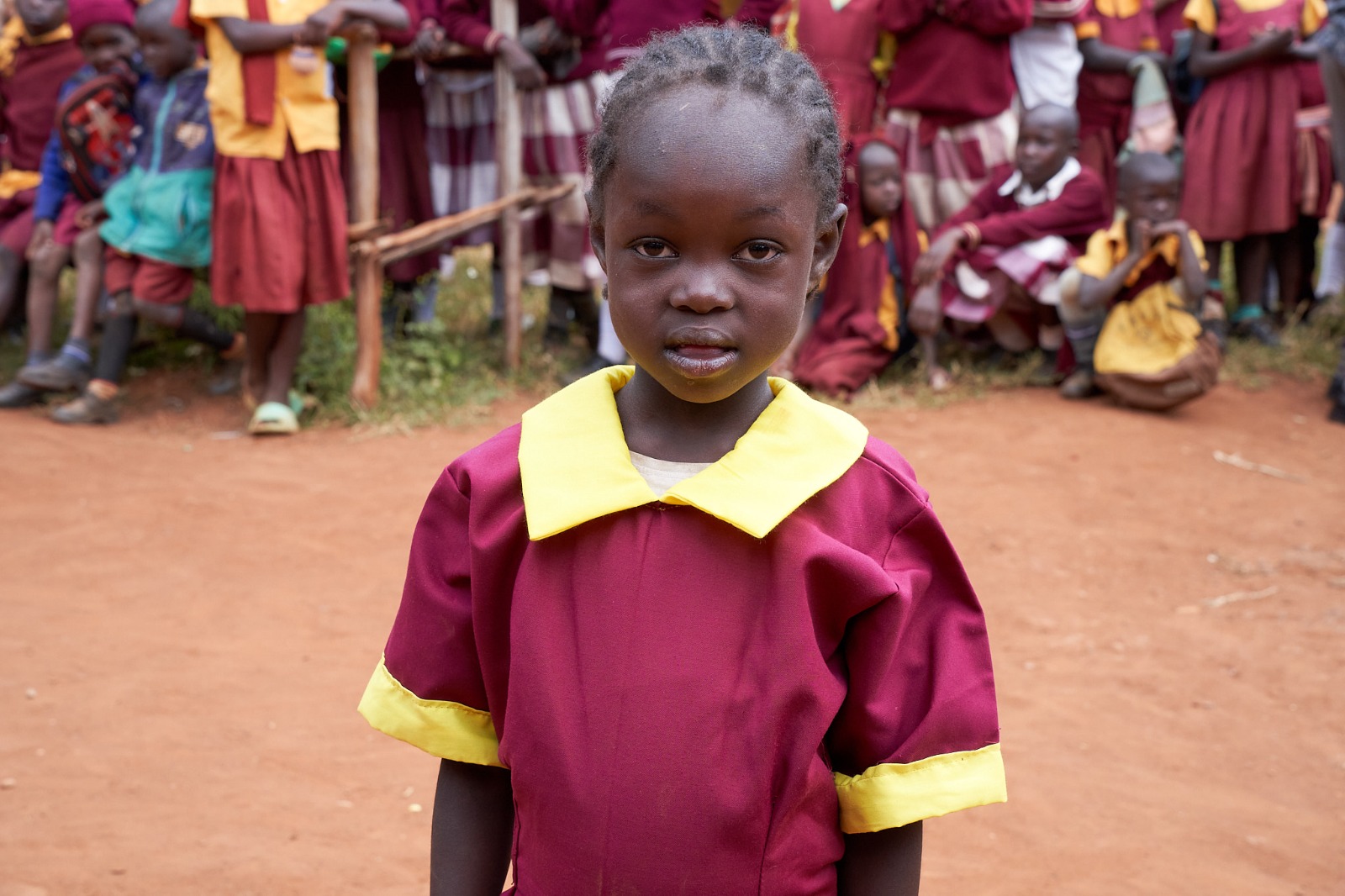 After: a learner confident in her new school uniform