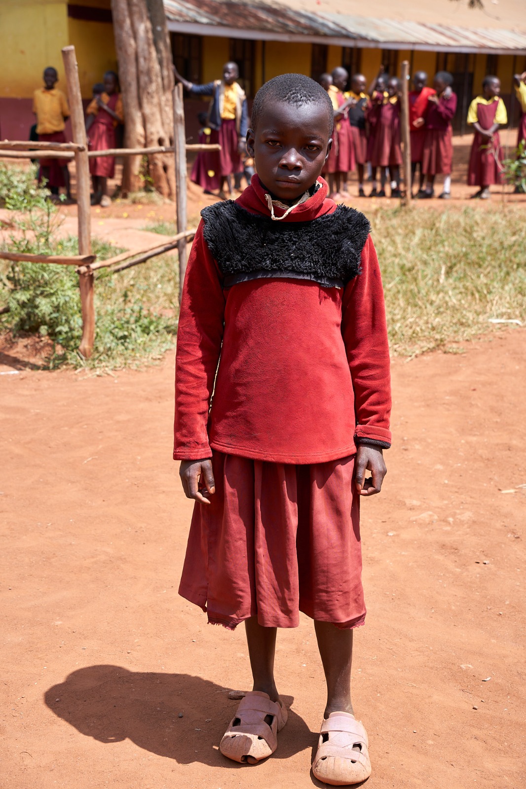 Before: a learner in worn, mismatched clothing